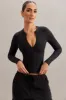 Long Sleeve Crop Top in Black sold by Oh Polly