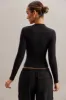 Long Sleeve Crop Top in Black sold by Oh Polly