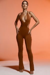 Petite Plunge Neck Cut Out Jumpsuit in Brown sold by Oh Polly