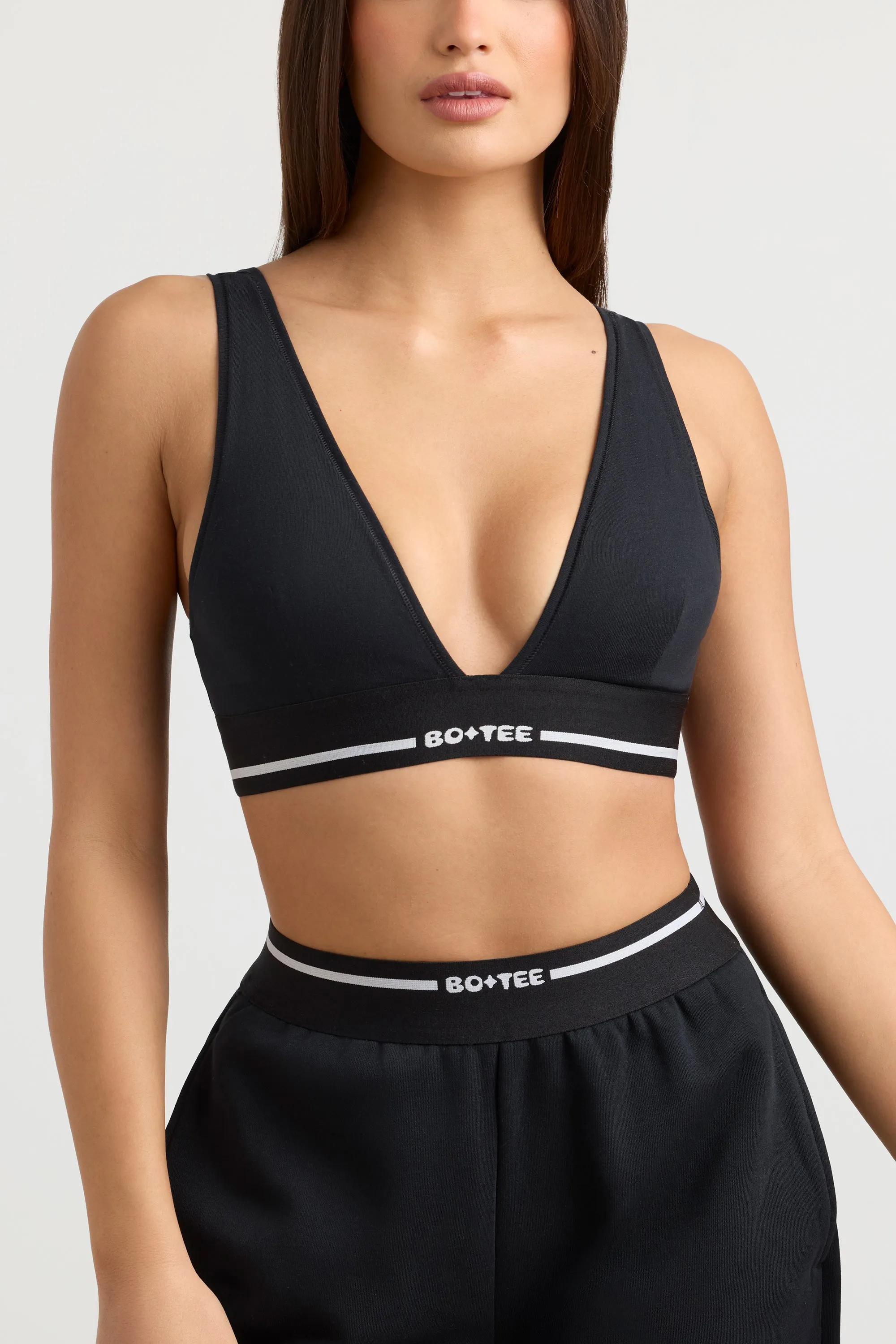 Stretch Cotton Jersey Plunge-Neck Crop Top in Black sold by Oh Polly product image thumbnail 4
