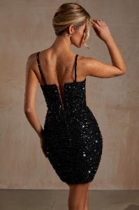Hand Embellished Couture Ruched Mini Dress in Black sold by Oh Polly