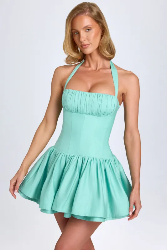 Ruched Halterneck Mini Dress in Sea Green sold by Oh Polly