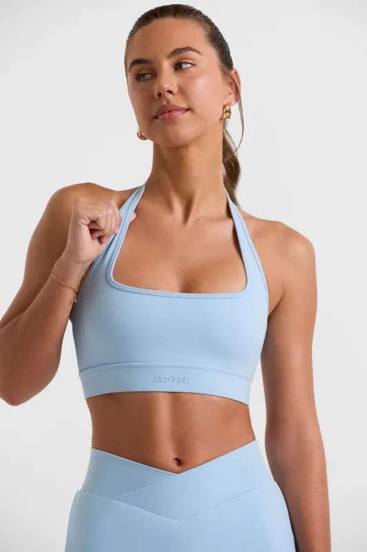 Halterneck Crop Top in Ice Blue sold by Oh Polly