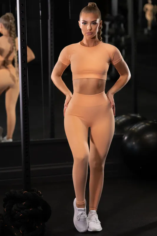 Determined Seamless Crop Top in Peach sold by Oh Polly
