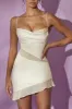 Cowl Neck Asymmetric Hem Mini Dress in White sold by Oh Polly