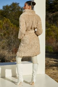 Belted Faux Fur Coat in Cream sold by Oh Polly