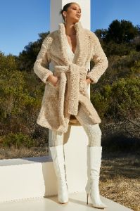 Belted Faux Fur Coat in Cream sold by Oh Polly