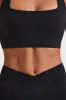 Halterneck Crop Top in Black sold by Oh Polly