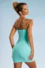 Asymmetric Cut Out Mini Dress in Aqua sold by Oh Polly