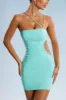 Asymmetric Cut Out Mini Dress in Aqua sold by Oh Polly