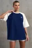 Oversized Slogan T-Shirt in Navy sold by Oh Polly