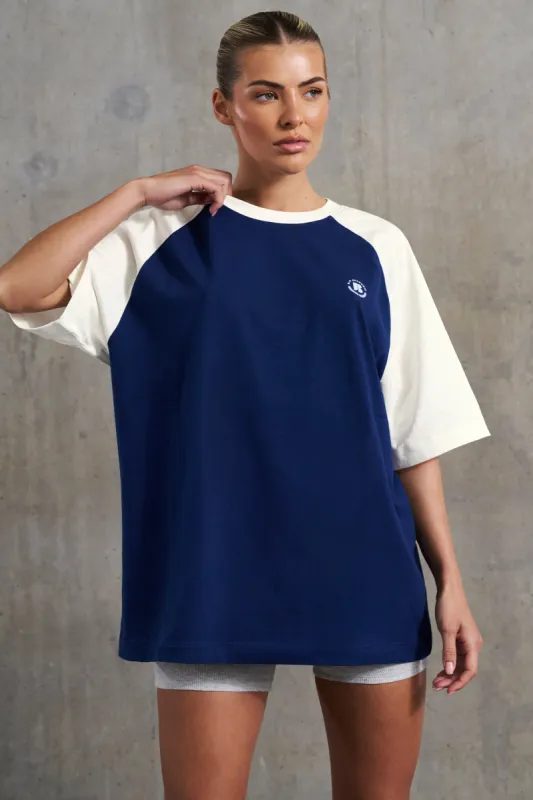 Oversized Slogan T-Shirt in Navy sold by Oh Polly