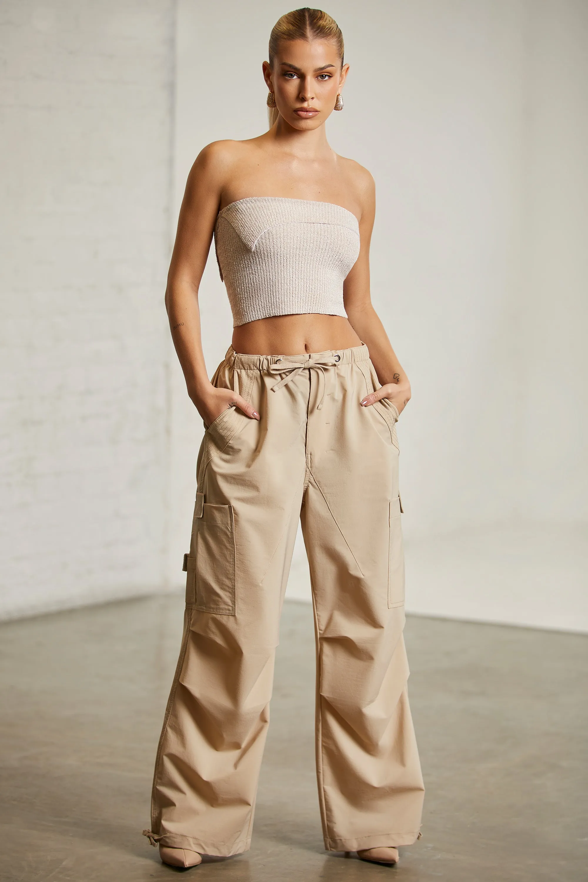 Wide Leg Cargo Trousers in Beige sold by Oh Polly