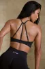 High Neck Open Back Define Luxe Sports Bra in Black sold by Oh Polly