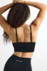 Super Sculpt Seamless Scoop-Neck Sports Bra in Black sold by Oh Polly