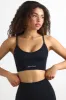 Super Sculpt Seamless Scoop-Neck Sports Bra in Black sold by Oh Polly