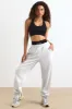 Petite Mid-Rise Joggers in Heather Grey sold by Oh Polly
