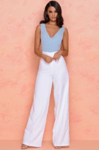 Thrill Wide High Waisted Flared Wide Leg Trousers in White sold by Oh Polly