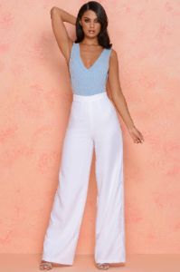 Thrill Wide High Waisted Flared Wide Leg Trousers in White sold by Oh Polly
