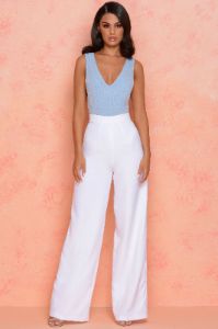 Thrill Wide High Waisted Flared Wide Leg Trousers in White sold by Oh Polly