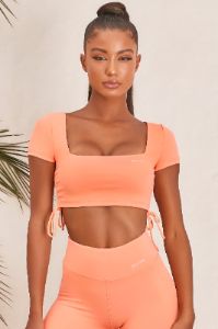 Ambition Slinky Crop Top in Orange sold by Oh Polly