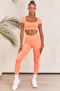 Ambition Slinky Crop Top in Orange sold by Oh Polly
