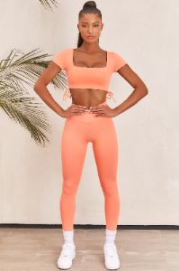 Ambition Slinky Crop Top in Orange sold by Oh Polly