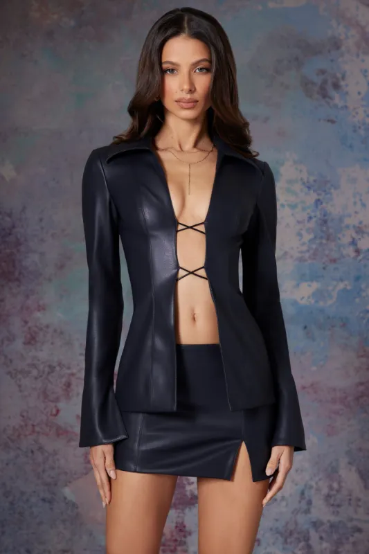 Vegan Leather Low Waist Mini Skirt in Midnight Black sold by Oh Polly