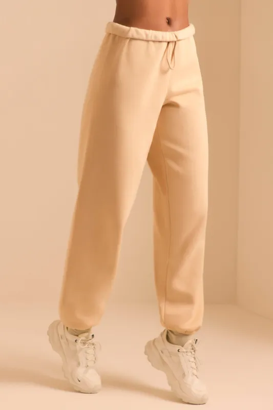 Petite Relaxed Fit Joggers in Sand sold by Oh Polly