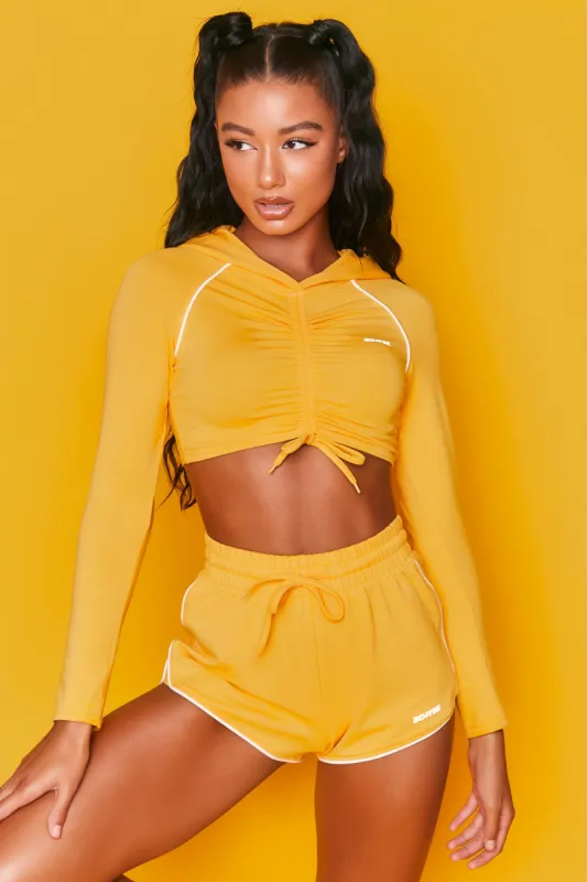 New Goals Cropped Ruched Hoodie in Orange made by Oh Polly