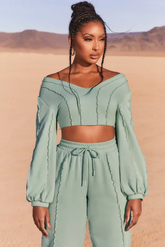 Uncovered Exposed Seam Bardot Crop Top in Blue sold by Oh Polly