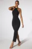 Embellished Halter Neck Low Back Evening Gown in Black sold by Oh Polly