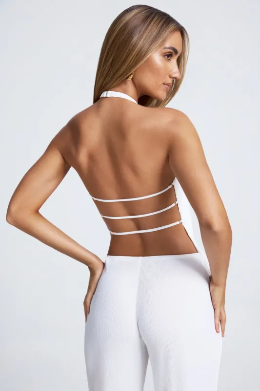 Open-Back Asymmetric Halterneck Top in White sold by Oh Polly