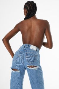 Ultra Distressed Wide Leg Jeans in Medium Blue Wash sold by Oh Polly