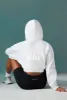 Cropped Drawstring Hooded Sweatshirt in Ice Grey sold by Oh Polly