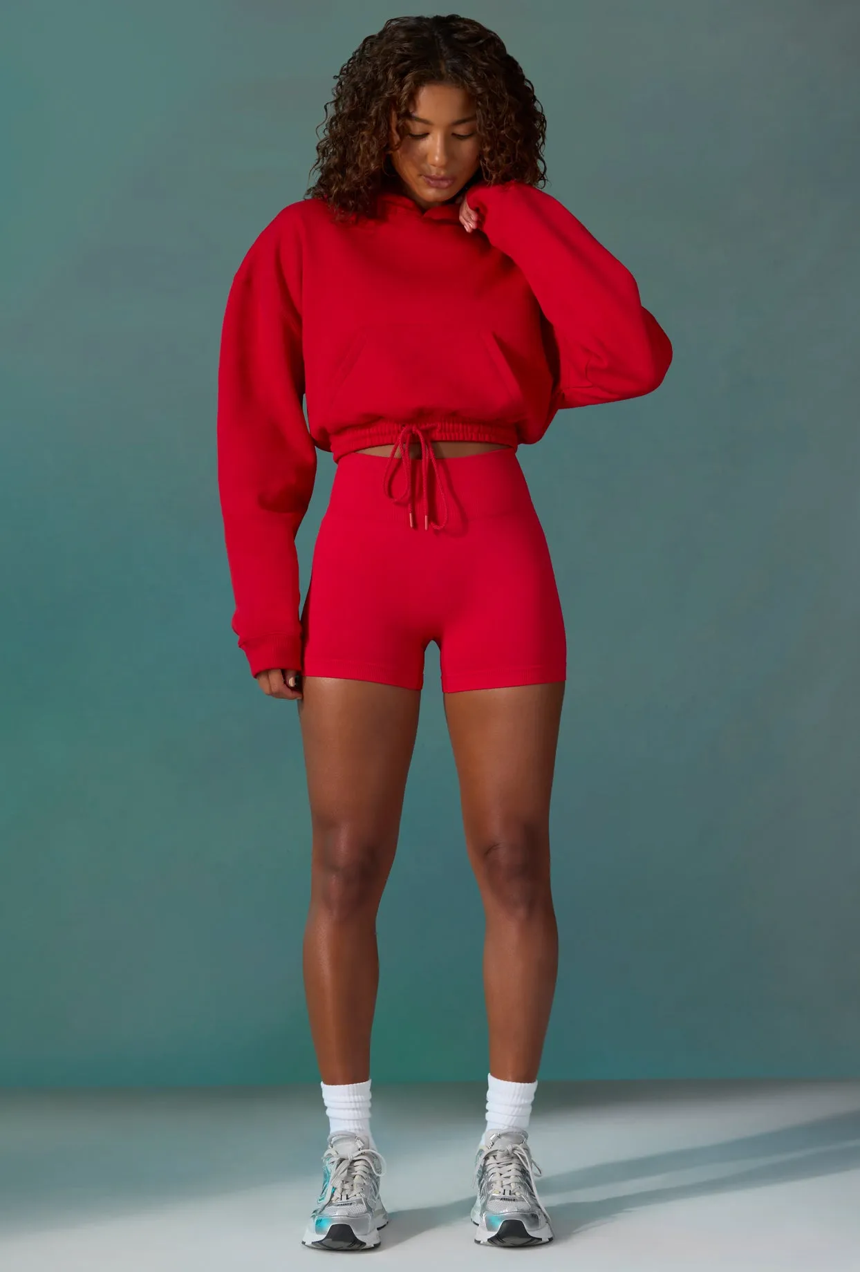 Cropped Drawstring Hooded Sweatshirt in Tango Red sold by Oh Polly product image thumbnail 5