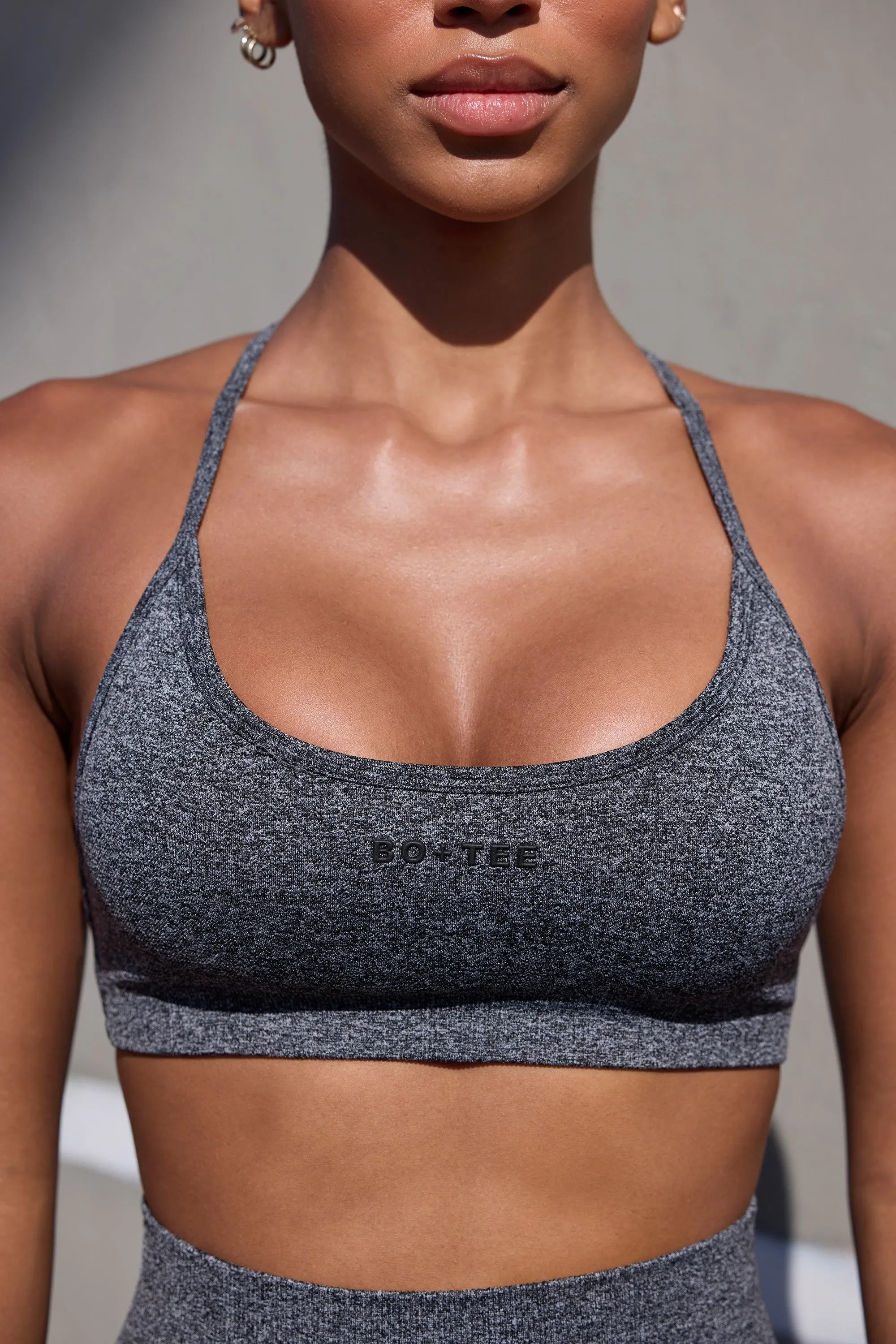 Super Sculpt Seamless Open Back Sports Bra in Marl Black sold by Oh Polly product image thumbnail 4