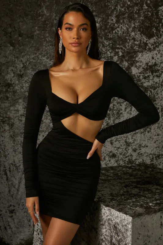 Long Sleeve Mini Dress in Black sold by Oh Polly