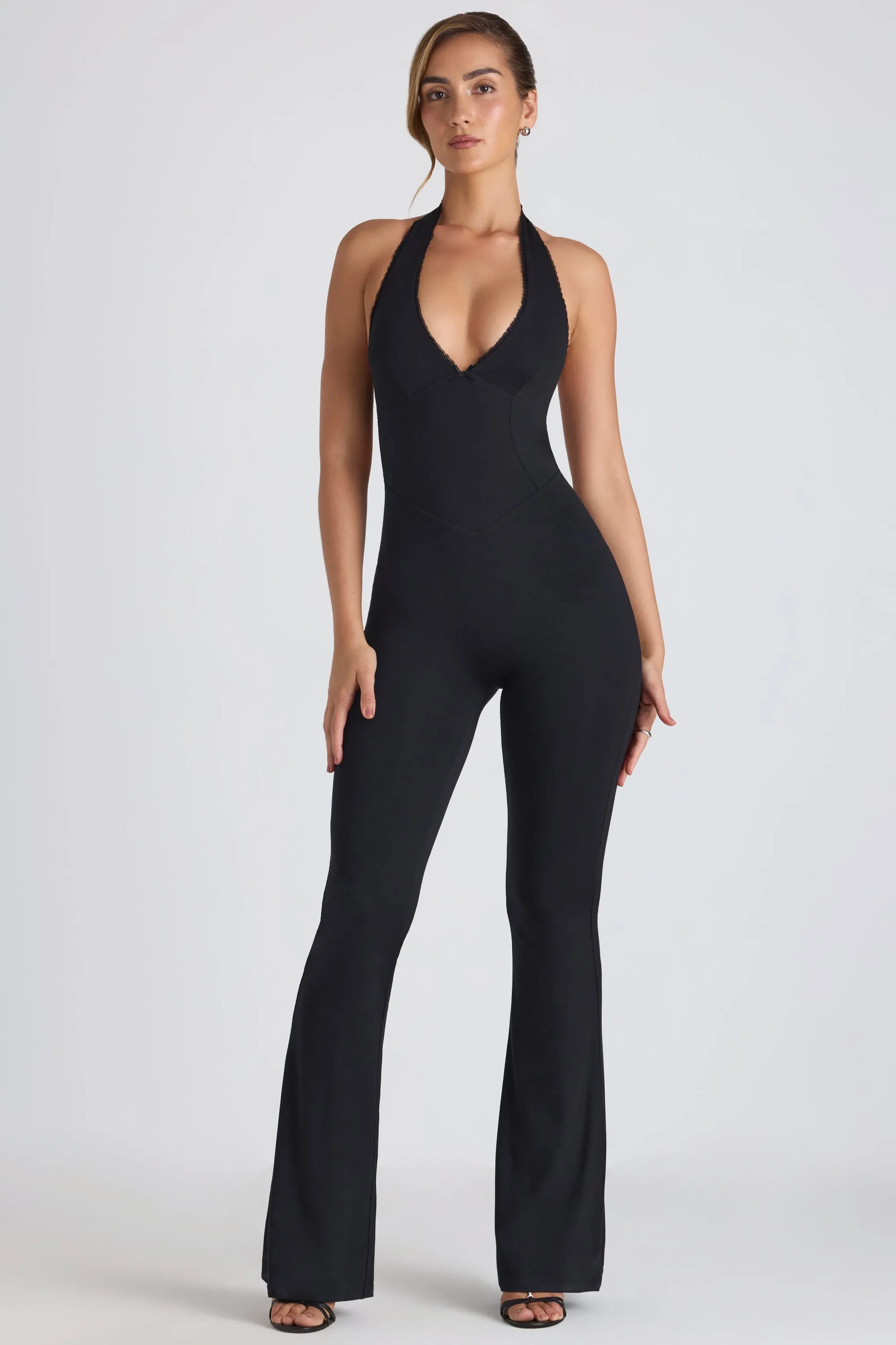 Petite Modal Lace-Trim Cut-Out Flared Jumpsuit in Black sold by Oh Polly product image thumbnail 2
