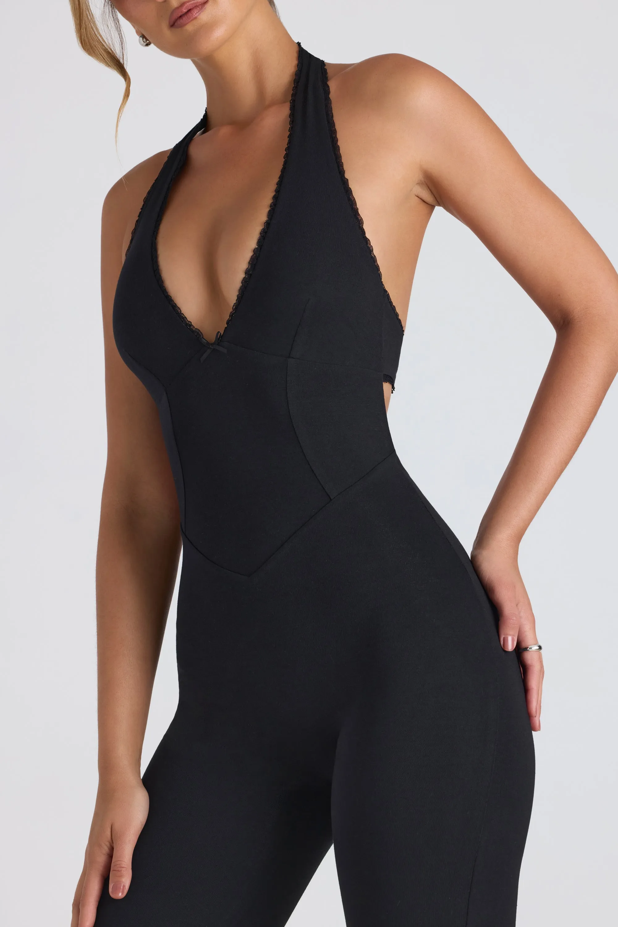 Petite Modal Lace-Trim Cut-Out Flared Jumpsuit in Black sold by Oh Polly product image thumbnail 4