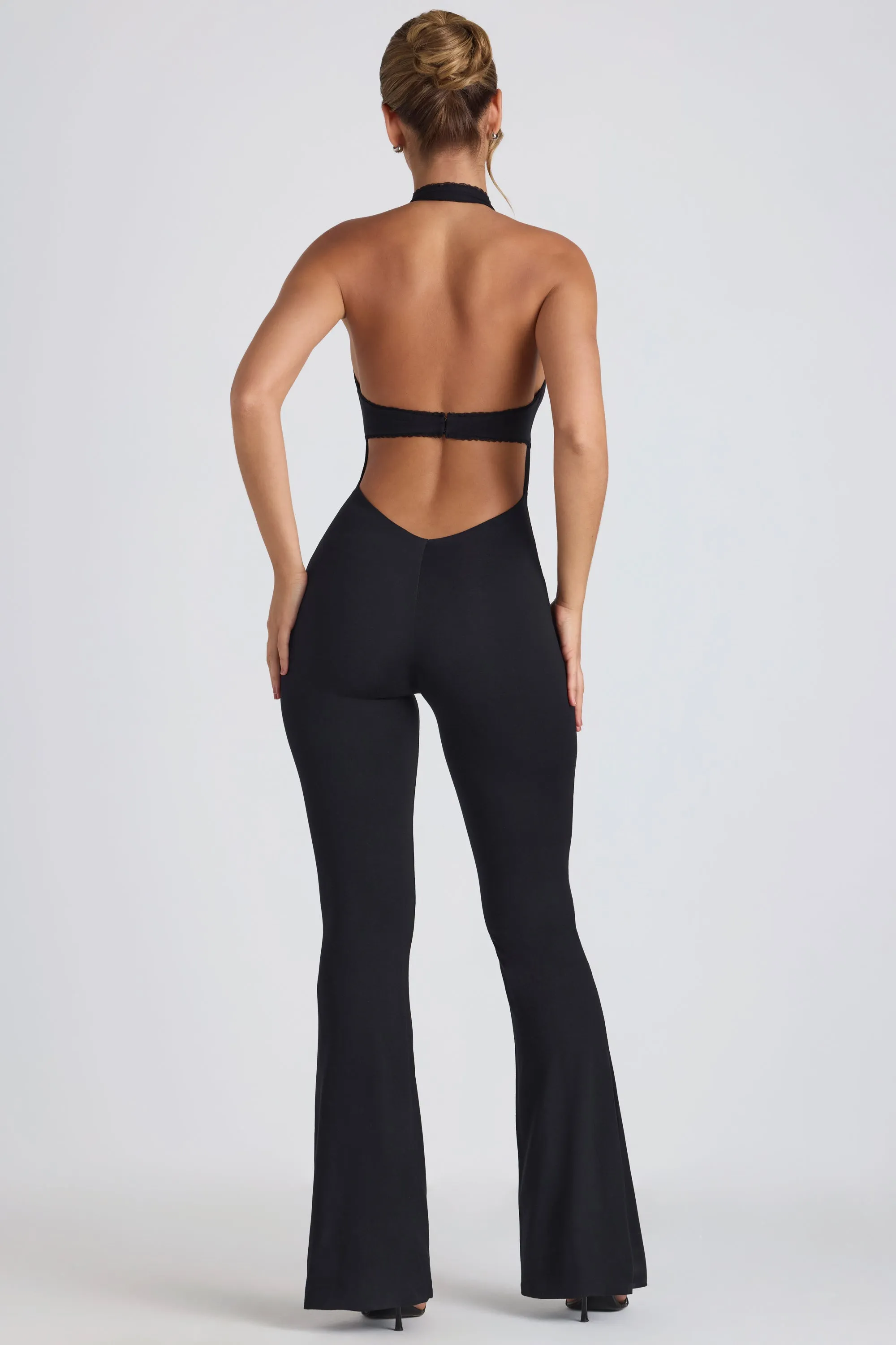 Petite Modal Lace-Trim Cut-Out Flared Jumpsuit in Black sold by Oh Polly product image thumbnail 5