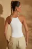 Racer Neck Ribbed Tank Top in White sold by Oh Polly