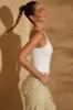 Racer Neck Ribbed Tank Top in White sold by Oh Polly
