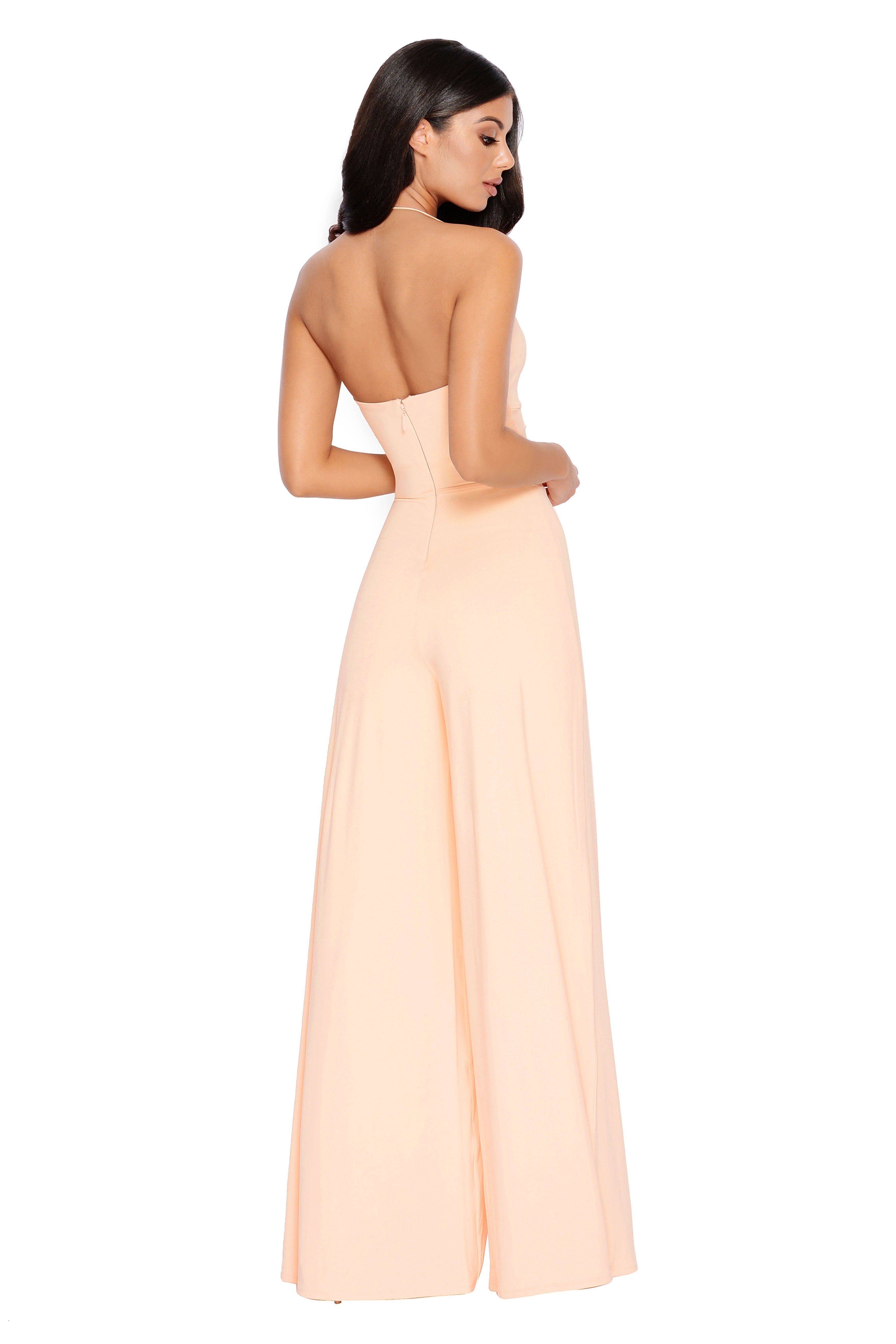 Don't Get It Twisted Cut Out Wide Leg Jumpsuit in Peach sold by Oh Polly