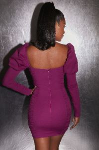 Outlasting Beauty Puff Shoulder Corset Mini Dress in Dark Purple sold by Oh Polly