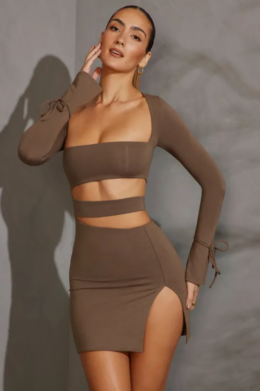 Long Sleeve Cut Out Mini Dress in Taupe sold by Oh Polly