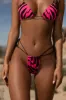 Wild Thing Tiger Print Micro Bikini Top in Neon Pink sold by Oh Polly