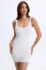 Low-Back Bodycon Mini Dress in White sold by Oh Polly