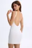 Low-Back Bodycon Mini Dress in White sold by Oh Polly