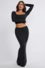 Ribbed Modal Mid Rise Maxi Skirt in Black sold by Oh Polly